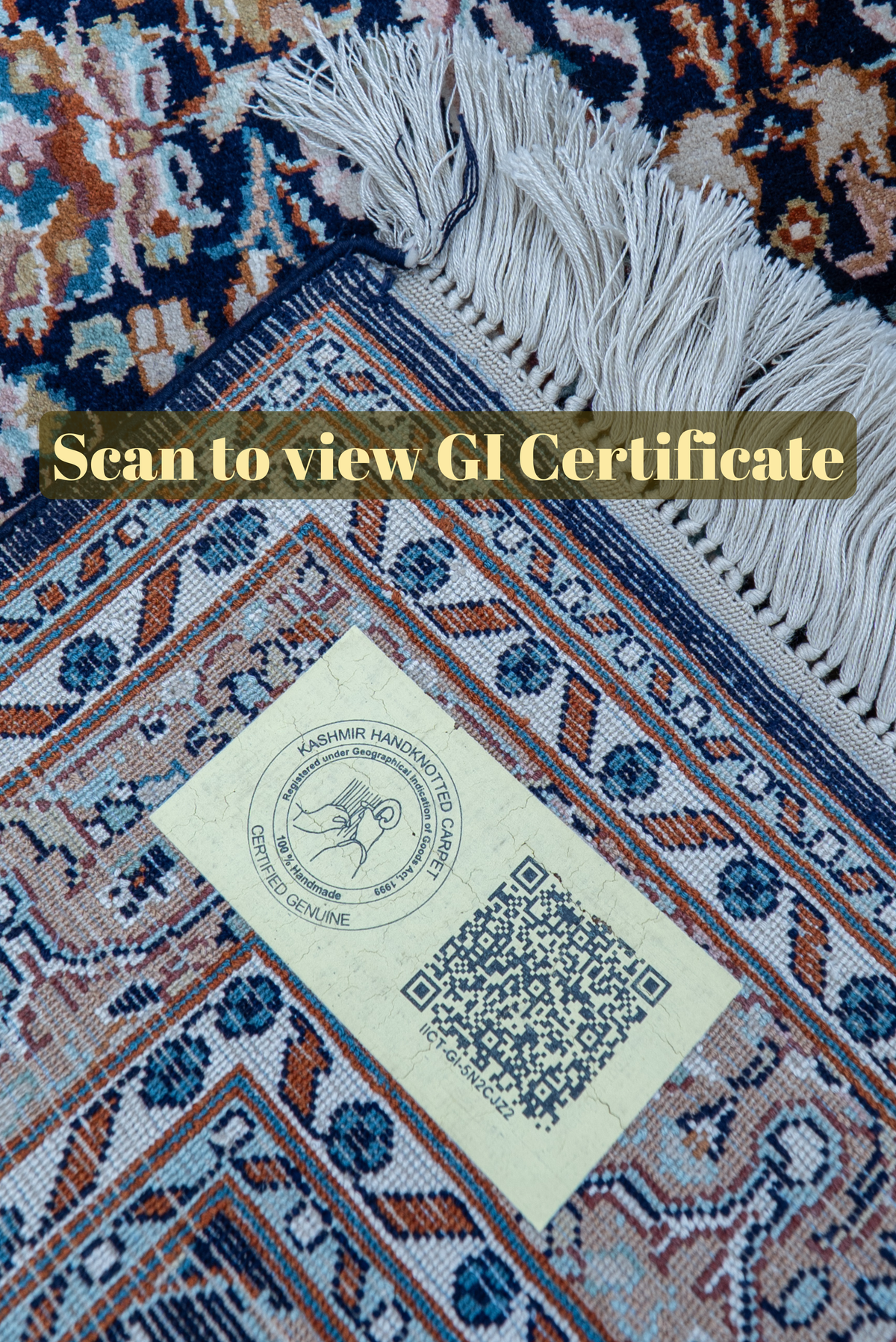 Carpet corner with white fringe and a QR label beneath the text Scan to view GI Certificate