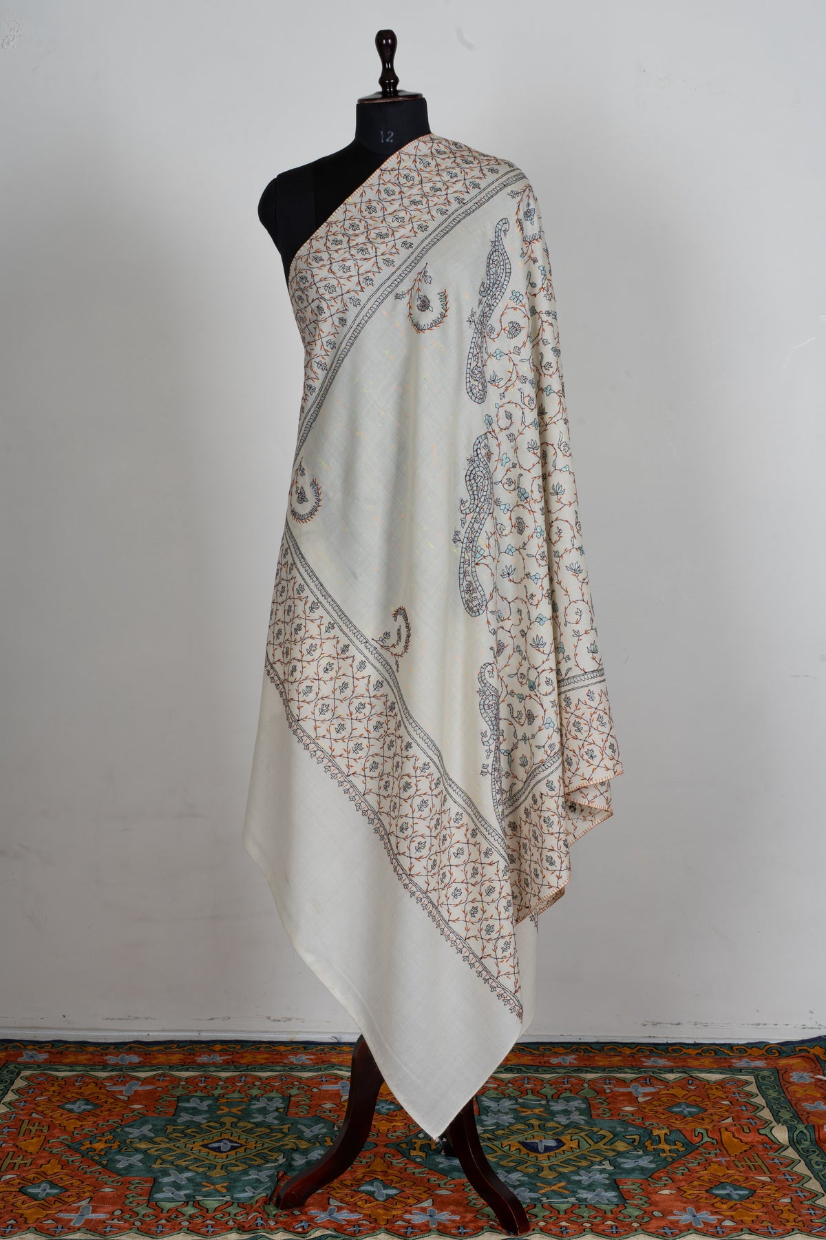 Ivory Whispers Sozni Hand Embroidered Fine merino wool Shawl with Delicate Blue and Rust Floral Vines