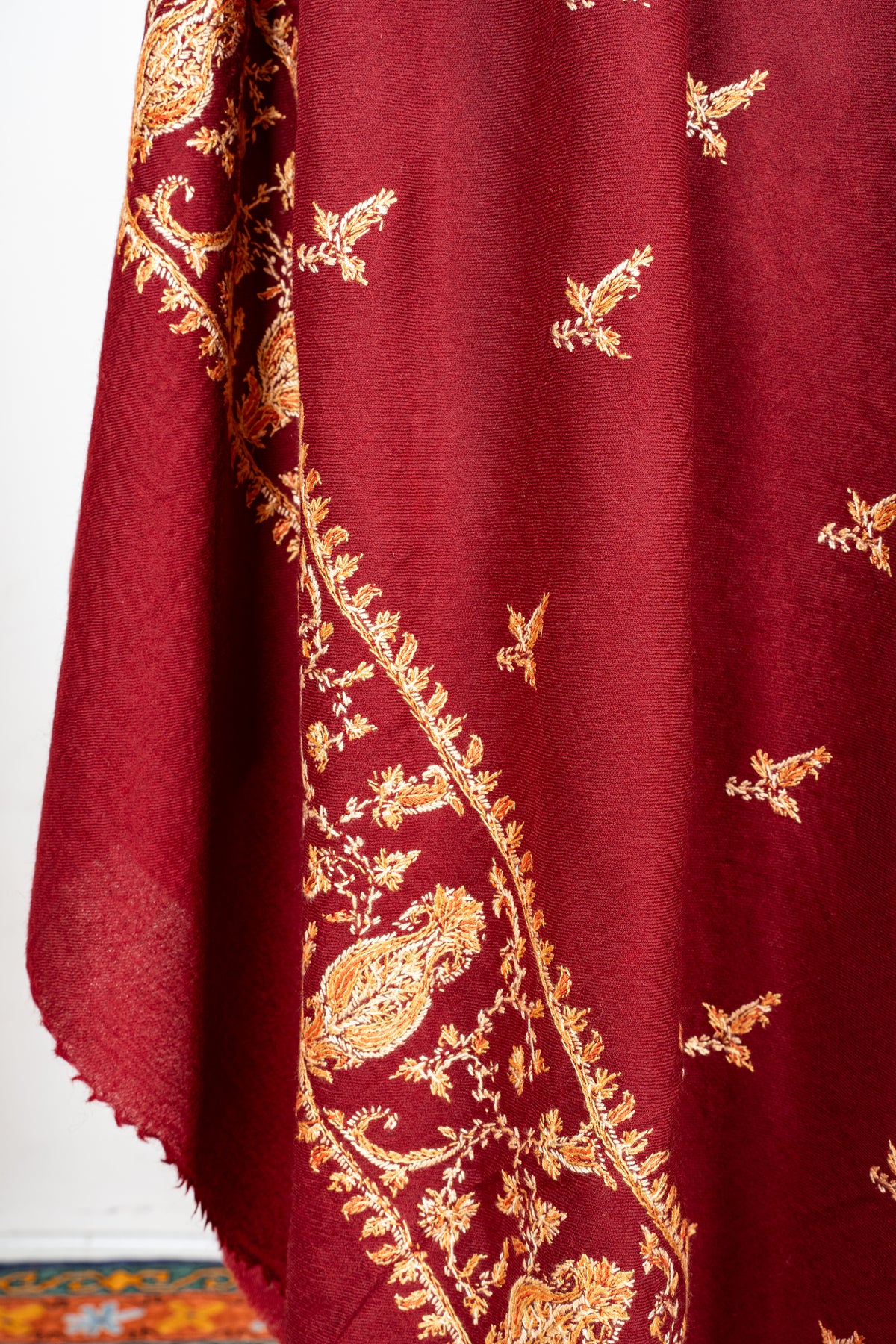 Royal Garnet Fine Merino Wool Shawl with Golden Sozni Hand Embroidered Floral Accents