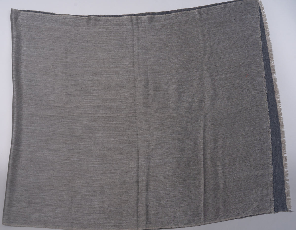 Ash-grey reverse of the stole laid flat, with a darker narrow end band and short pale fringe.