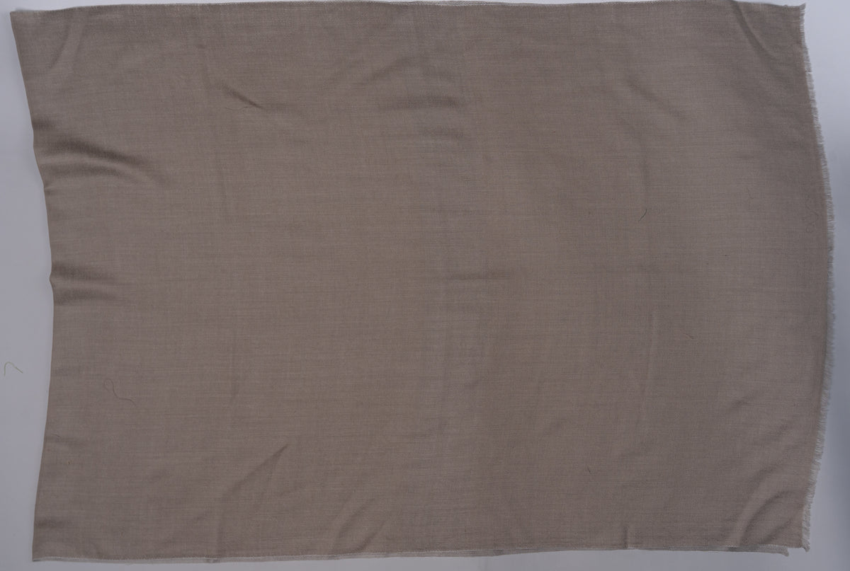 Plain taupe side of the reversible Merino wool stole laid flat in a rectangle
