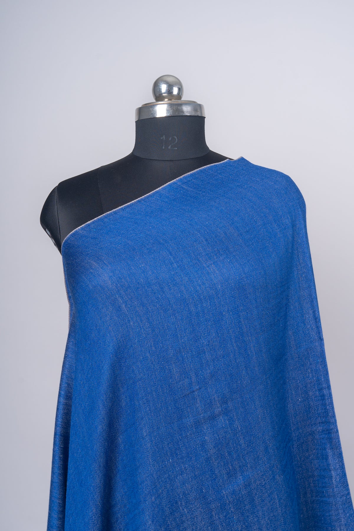 Neela Aab: Reversible Merino Wool Stole in Sapphire & Frost Grey