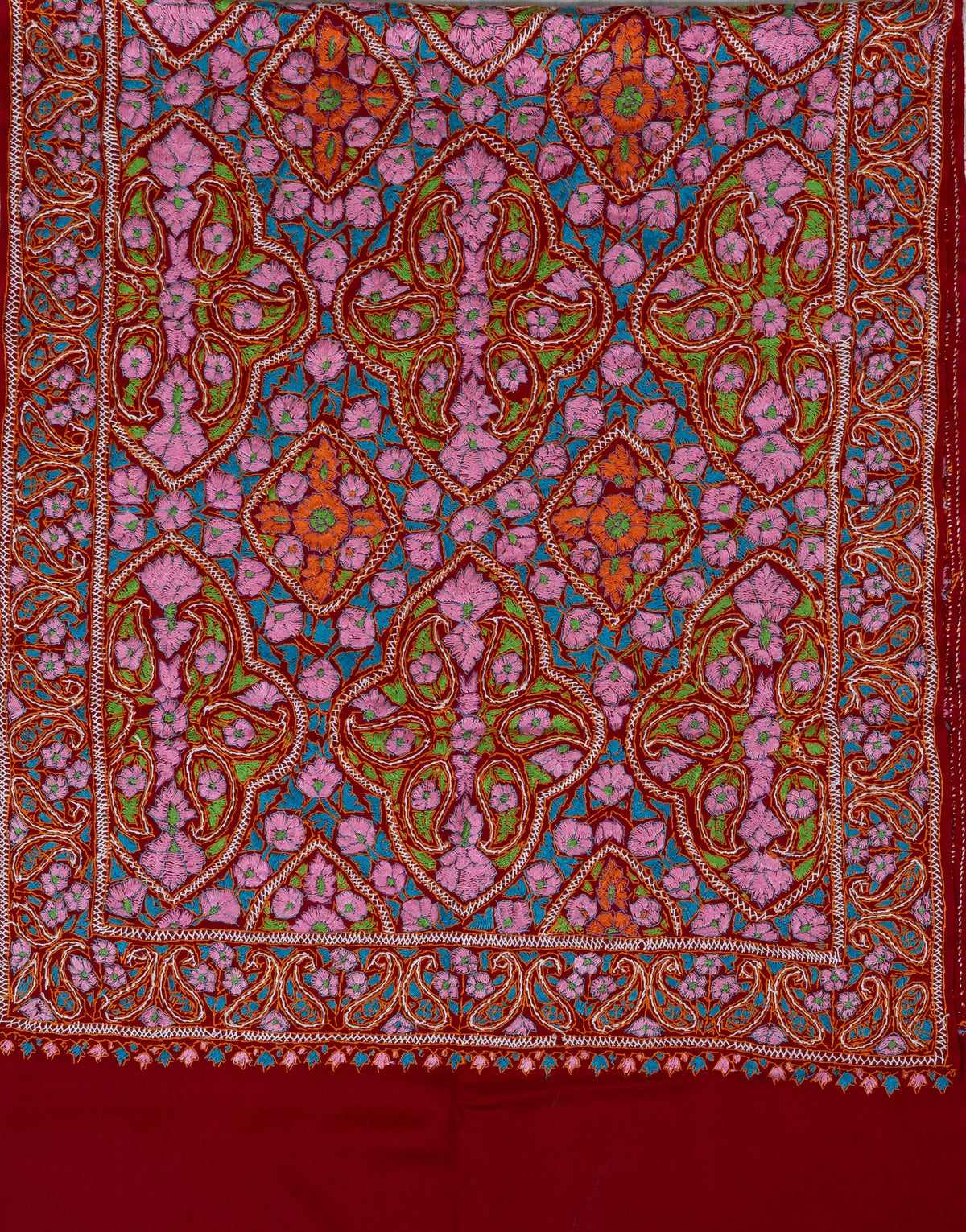 Red Merino wool stole laid flat with multicoloured Sozni floral panels, paisley borders and a plain red end panel.