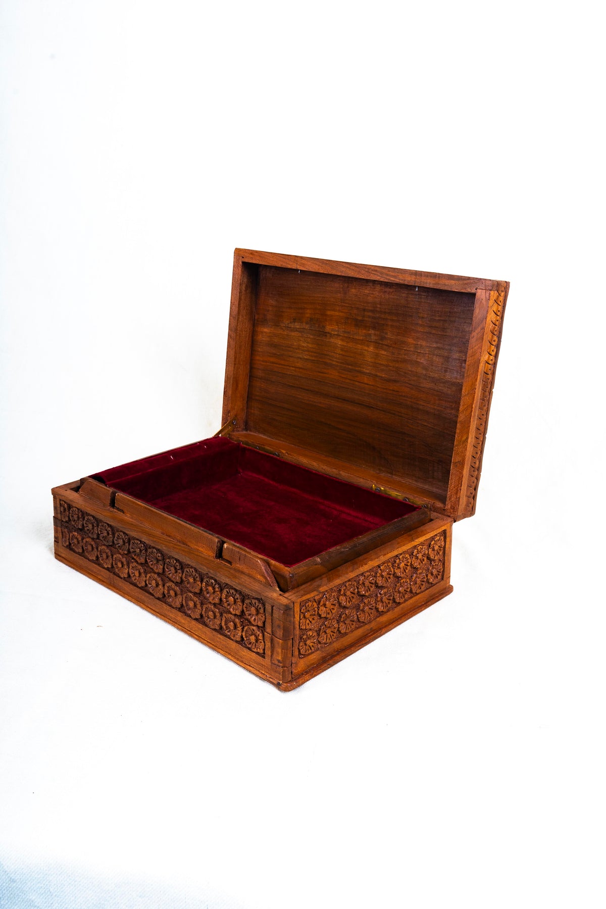 Opposite angled view of the open walnut jewellery box with its red-lined interior and raised hinged lid