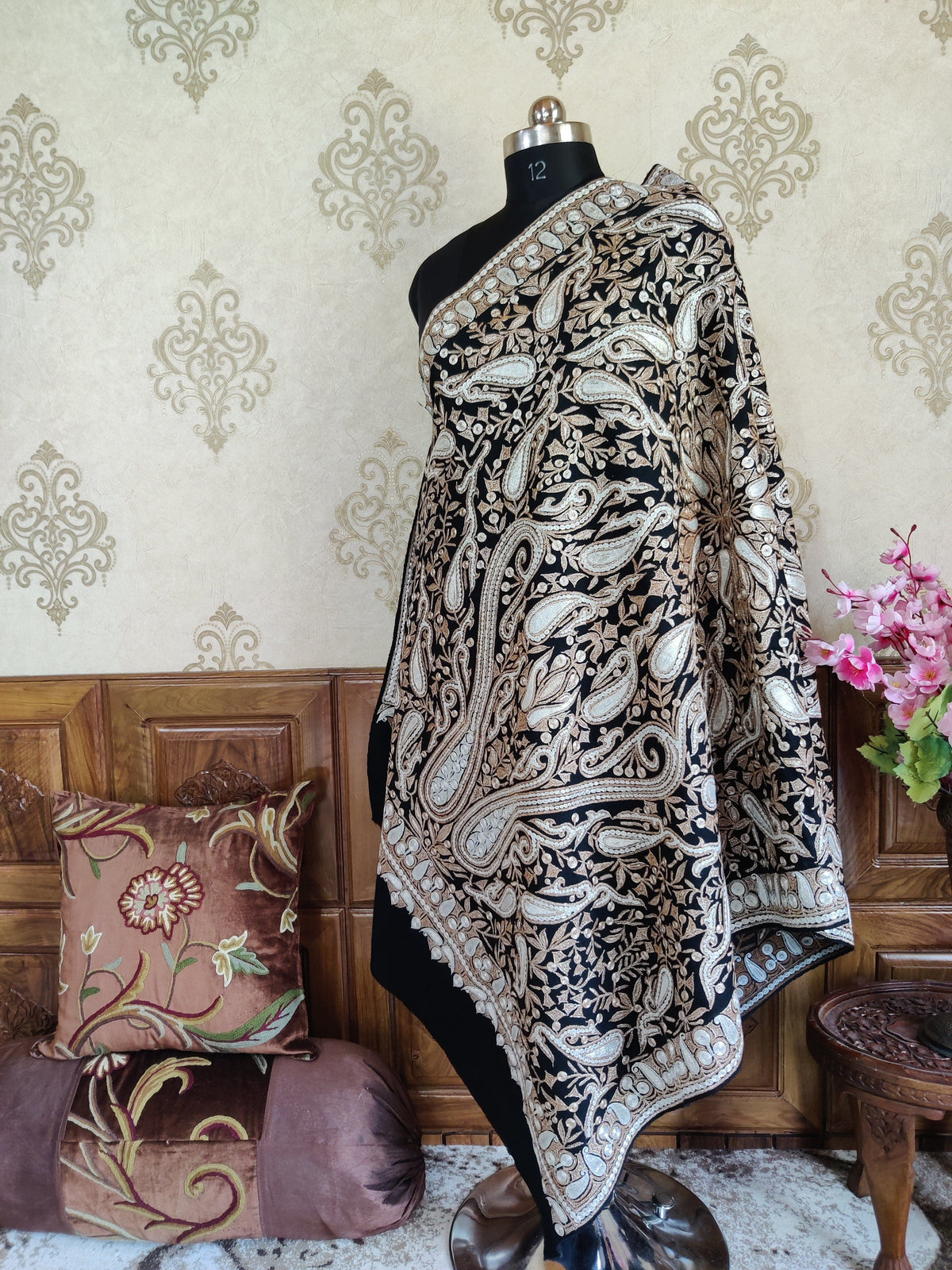 Black Merino wool shawl in a loose shoulder drape, with a folded-back side edge and dense paisley Tilla embroidery