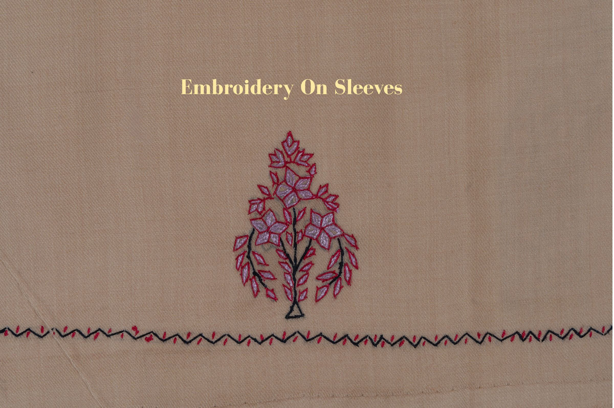 Sleeve detail on sand-beige fabric: rose-pink floral sprig above a narrow zigzag border, labelled Embroidery On Sleeves