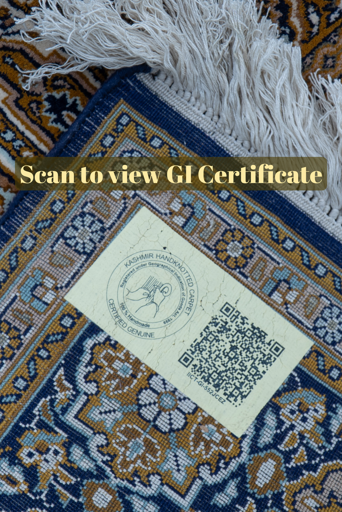 Carpet corner with white fringe and a QR label beneath the text Scan to view GI Certificate