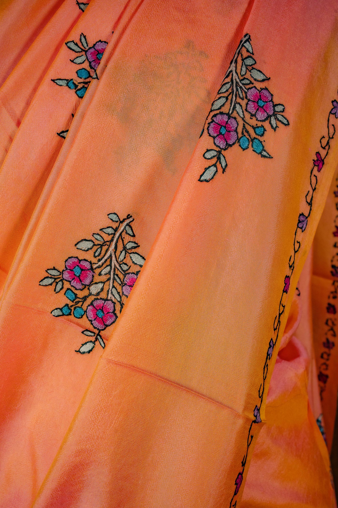 Radiance in Threads: Orange Pure Silk Saree Adorned with Traditional Sozni Embroidery - KashmKari