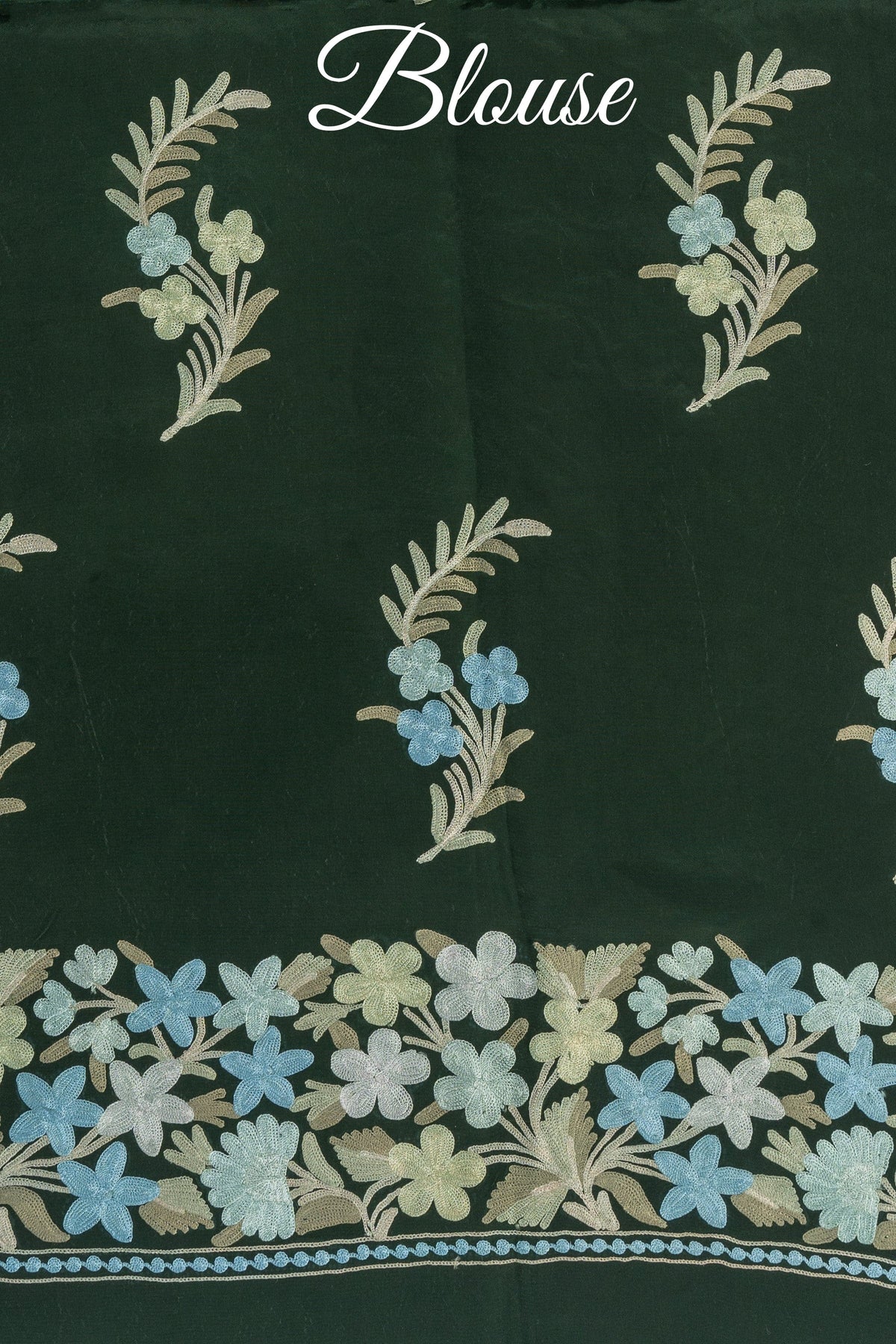 Green blouse fabric labelled Blouse, with cream and pale blue Aari flower sprigs above a broad floral border