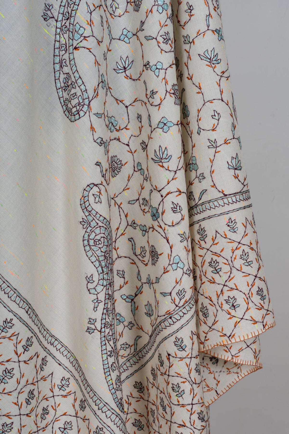 Ivory Whispers Sozni Hand Embroidered Fine merino wool Shawl with Delicate Blue and Rust Floral Vines