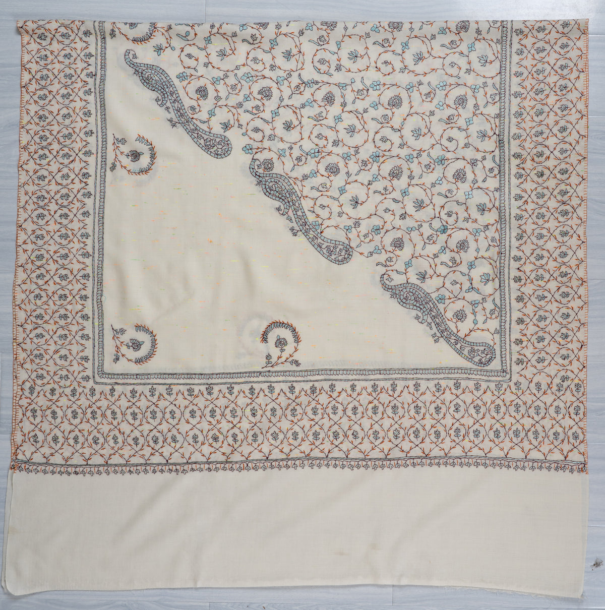 Ivory Whispers Sozni Hand Embroidered Fine merino wool Shawl with Delicate Blue and Rust Floral Vines