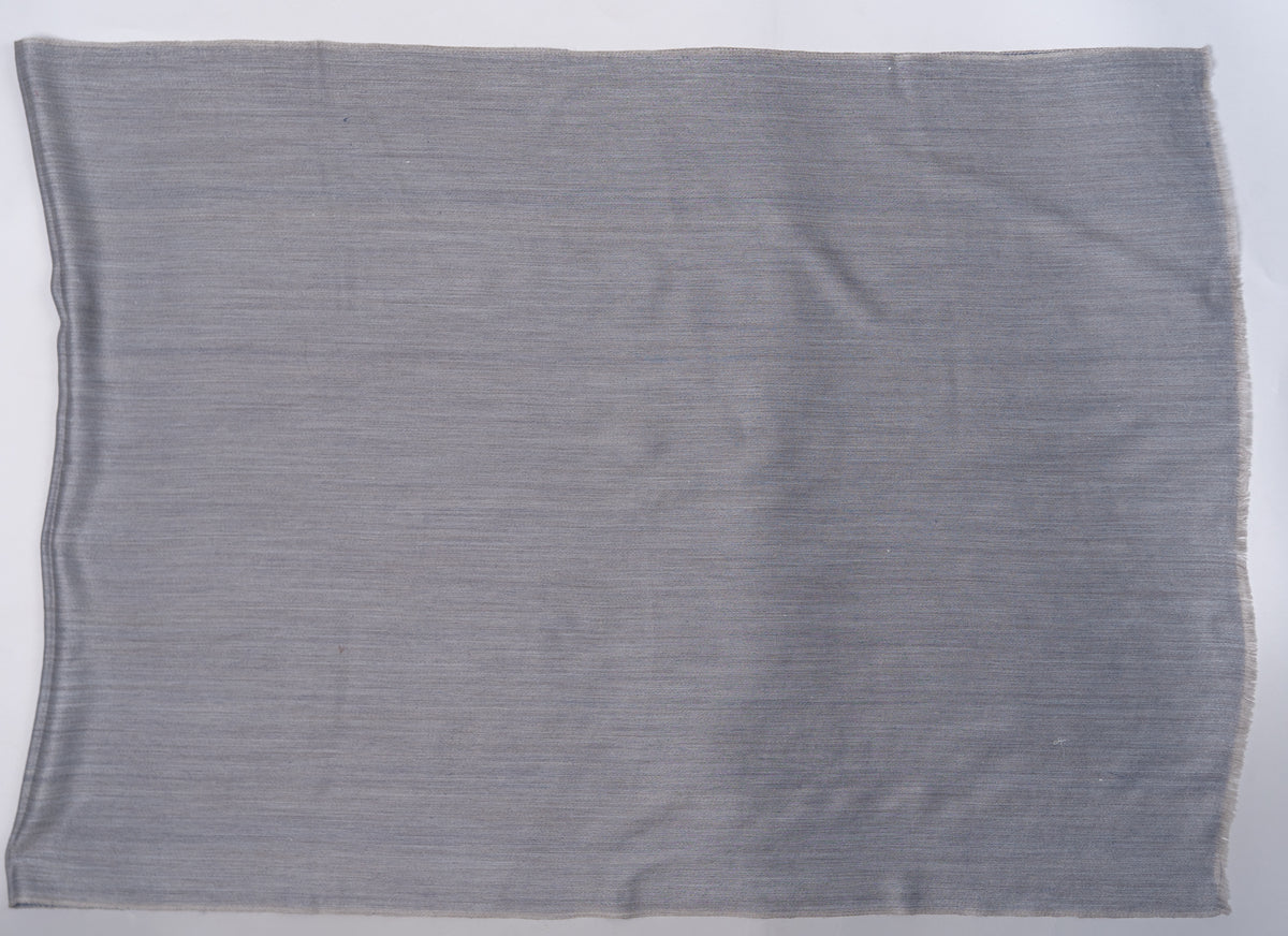 Slate-grey reverse of the stole laid flat with a fine horizontal weave and lightly fringed edges.
