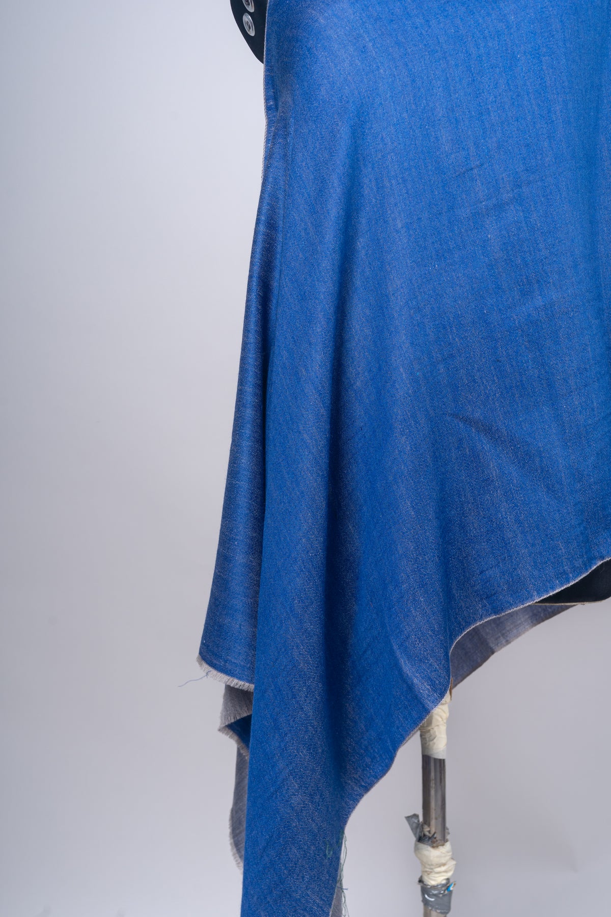 Neela Aab: Reversible Merino Wool Stole in Sapphire & Frost Grey