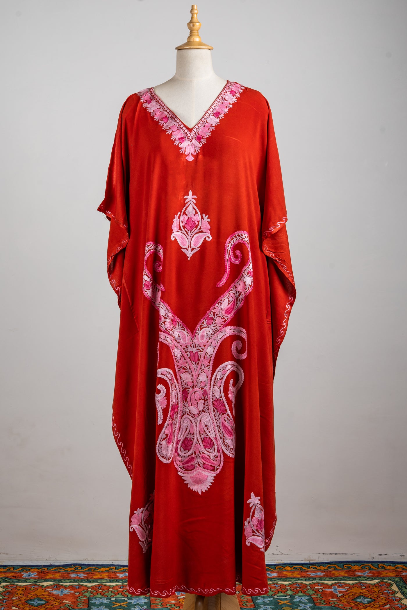 Crimson Bloom Aari Embroidered Kaftans with Pink Motifs