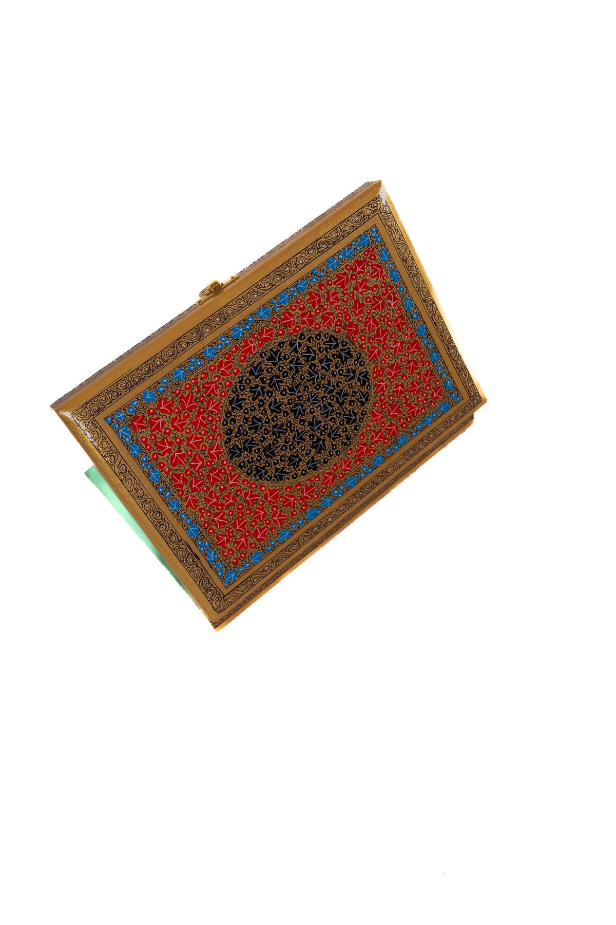 Oblique overhead view of the raised painted lid with a dark circular centre and a glimpse of the green interior rim.