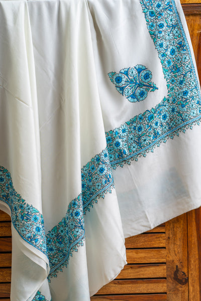 Exquisite Sozni Hand Embroidered Pure Crepe Saree in Serene Blue