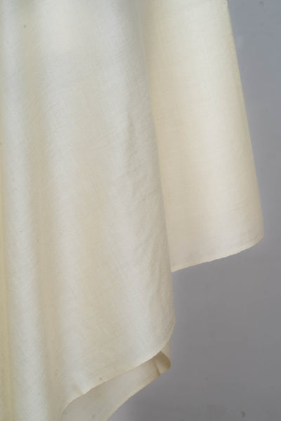 Ivory Glow: A Plain Merino Wool Shawl in Classic White