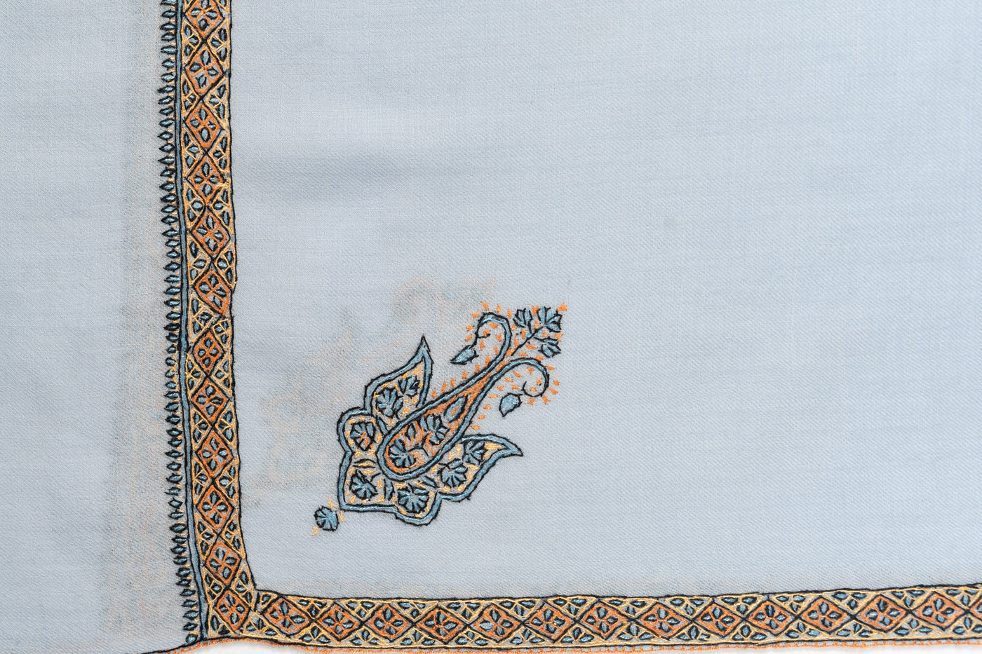 Serene Sophistication: Hand-Embroidered Sozni Border Merino Wool Shawl in Powder Blue