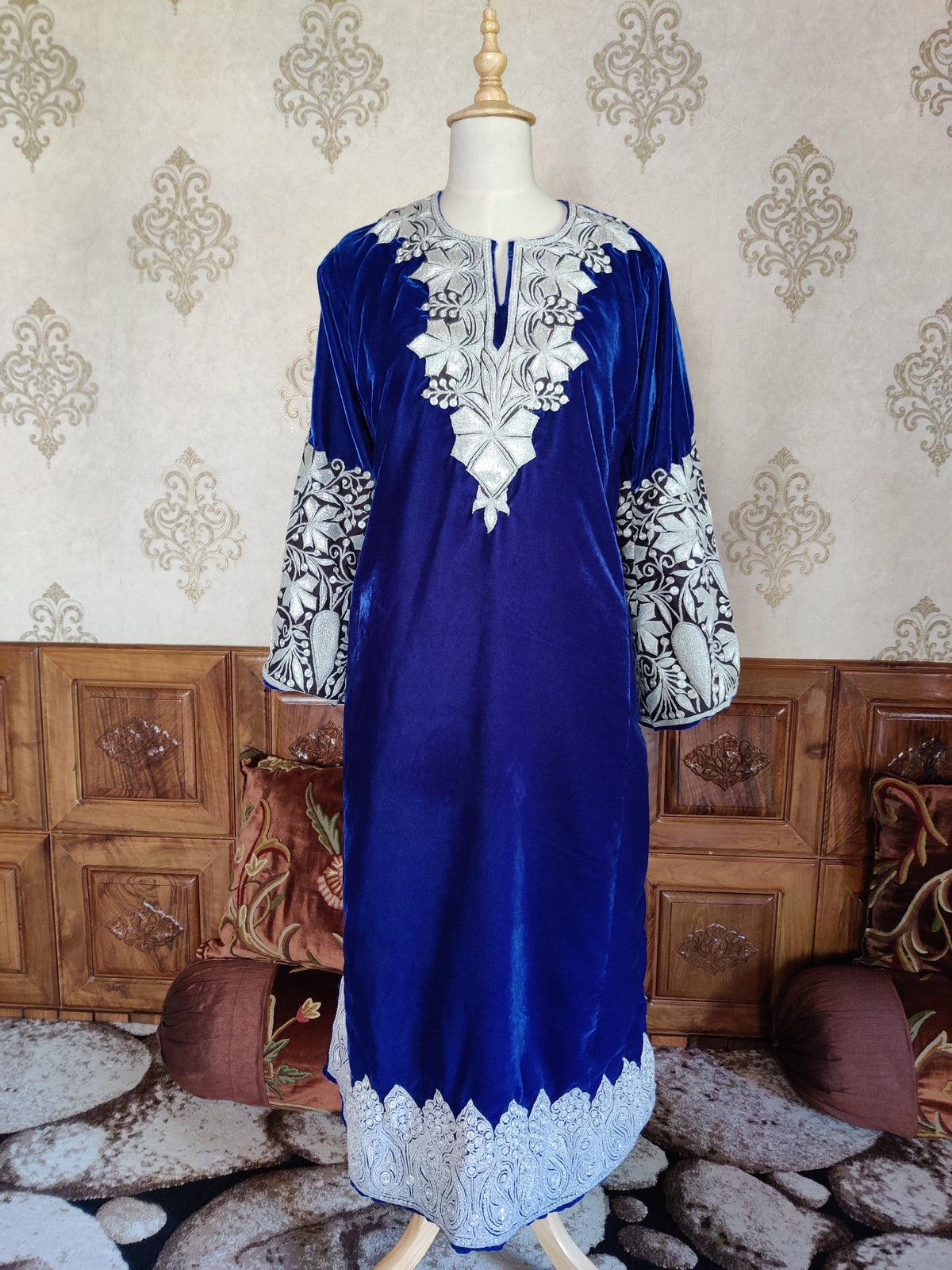 Full front view of the royal-blue velvet pheran without the stole, with silver-toned embroidery at the neckline, cuffs and hem.