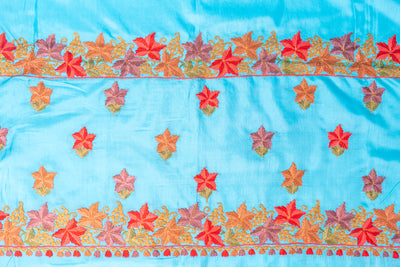 Turquoise Tranquility Pure Silk Hand Aari Embroidery Saree