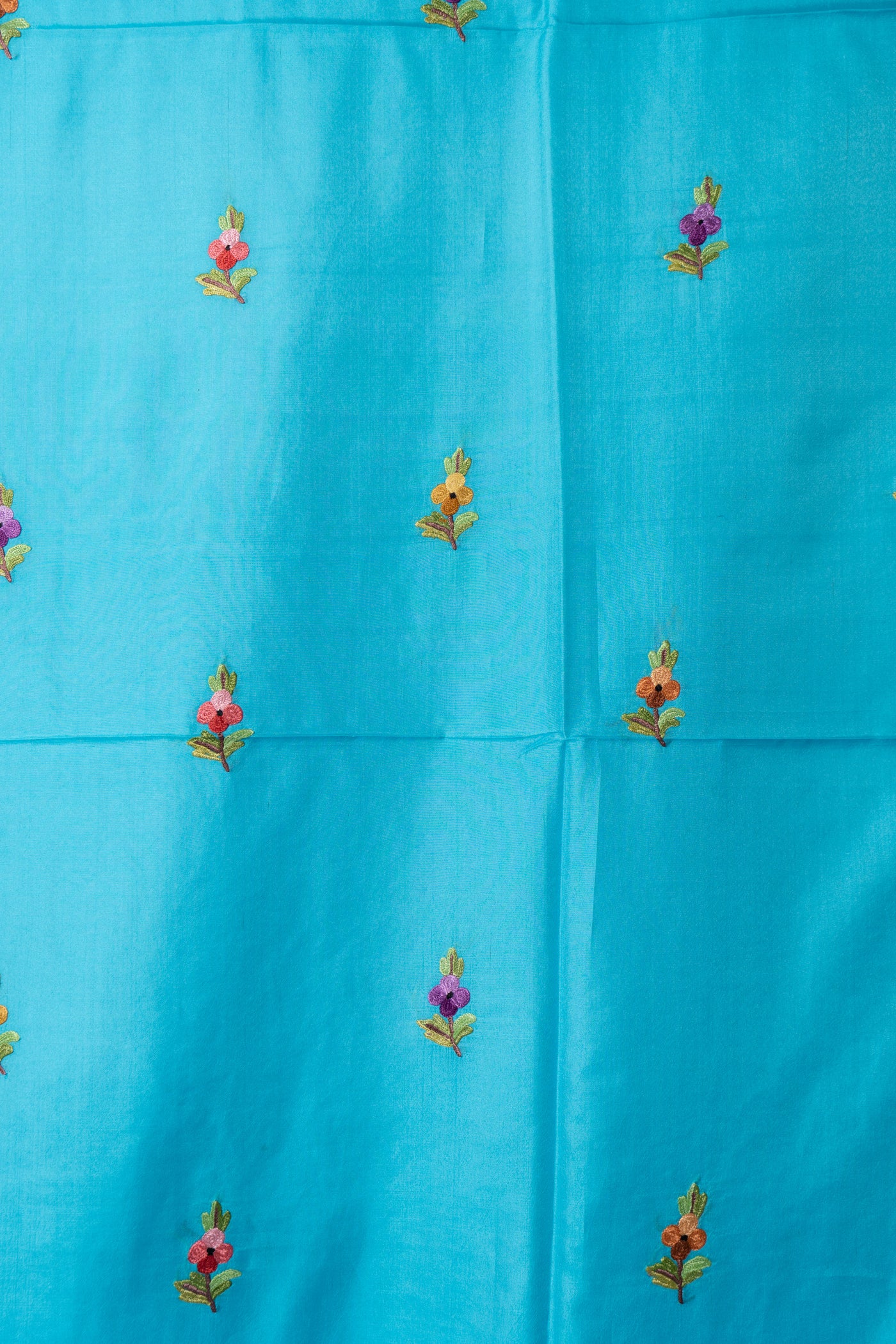 Aquamarine Delight Pure Crepe Hand Aari Embroidery Saree