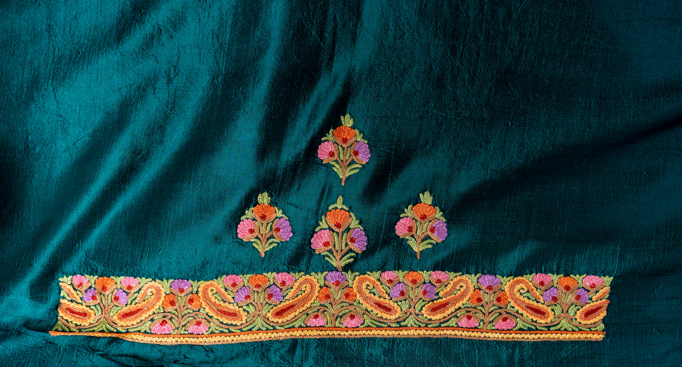 Emerald Elegance: Pure Silk Saree with Hand Aari Embroidery